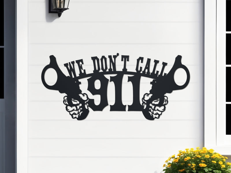 Decorative sign with 'We Don't Call 911' text on a white wall.