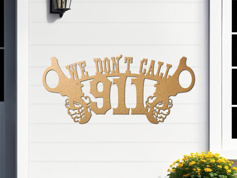Gold decorative metal sign with 'We Don't Call 911' text on a white wall.