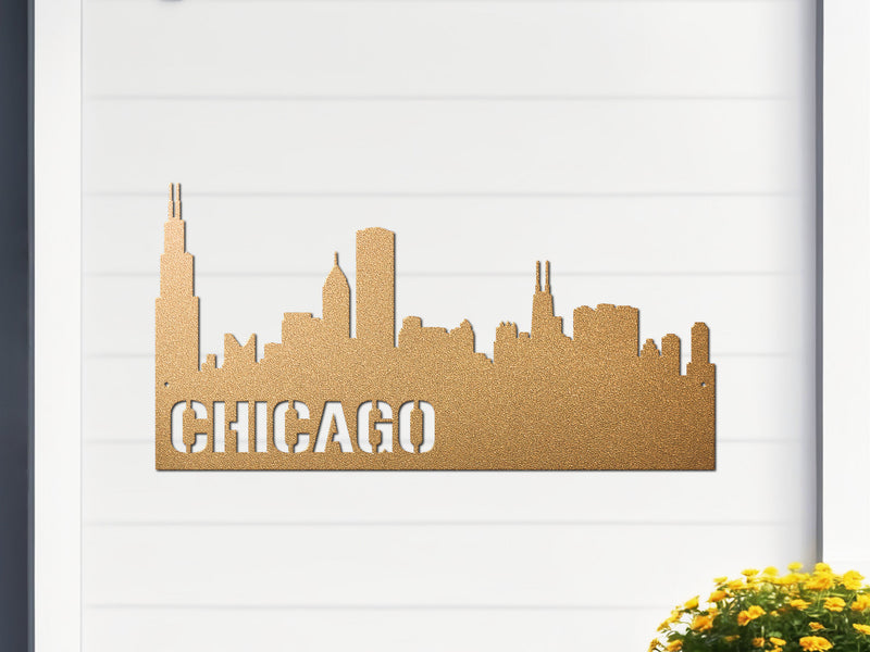 Gold metal sign of Chicago skyline with 'CHICAGO' text on a white 